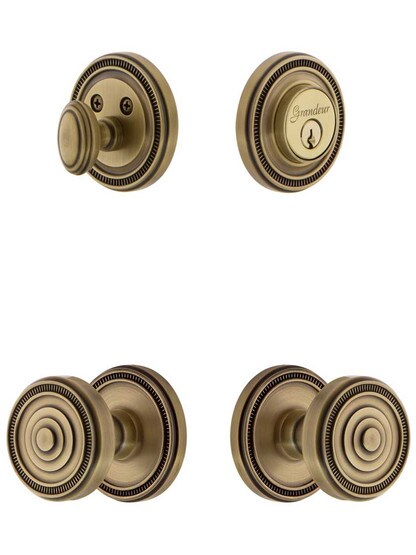 Grandeur Soleil Entry Door Set, Keyed Alike with Soleil Knobs in Antique Brass.